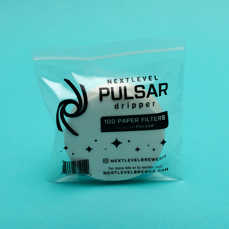 nextlevel pulsar dripper filters. package of 100. pictured with a turquoise background. 